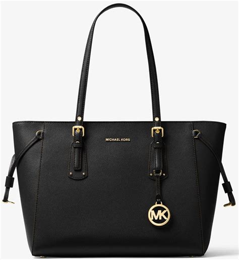 spot a fake michael kors tote bag|are michael kors purses genuine.